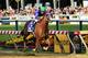 BALTIMORE, MD - MAY 17: California Chrome #3, ridden by Victor Espinoza, races to the finishline to win during the 139th running of the Preakness Stakes at Pimlico Race Course on May 17, 2014 in Baltimore, Maryland. (Photo by Patrick Smith/Getty Images)