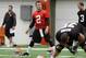 Cleveland Browns quarterback Johnny Manziel (2) stretches before a rookie minicamp practice at the NFL football team's facility in Berea, Ohio Saturday, May 17, 2014. (AP Photo/Mark Duncan)