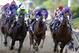 California Chrome, center, ridden by Victor Espinoza, Pablo Del Monte, right, ridden by Jeffrey Sanchez, and Ria Antonia, left, ridden by Calvin Borel, race to the first turn during the 139th Preakness Stakes horse race at Pimlico Race Course, Saturday, May 17, 2014, in Baltimore. California Chrome won the race. (AP Photo/Patrick Semansky)