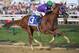 BALTIMORE, MD - MAY 17: California Chrome #3, ridden by Victor Espinoza, races to the finishline to win the 139th running of the Preakness Stakes at Pimlico Race Course on May 17, 2014 in Baltimore, Maryland. (Photo by Molly Riley/Getty Images)