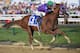 BALTIMORE, MD - MAY 17: California Chrome #3, ridden by Victor Espinoza, races to the finishline to win the 139th running of the Preakness Stakes at Pimlico Race Course on May 17, 2014 in Baltimore, Maryland. (Photo by Molly Riley/Getty Images)