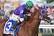 BALTIMORE, MD - MAY 17: California Chrome #3, ridden by Victor Espinoza, races to the finishline to win the 139th running of the Preakness Stakes at Pimlico Race Course on May 17, 2014 in Baltimore, Maryland. (Photo by Molly Riley/Getty Images)