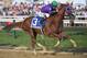 BALTIMORE, MD - MAY 17: California Chrome #3, ridden by Victor Espinoza, races to the finishline to win the 139th running of the Preakness Stakes at Pimlico Race Course on May 17, 2014 in Baltimore, Maryland. (Photo by Molly Riley/Getty Images)