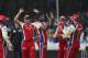 Royal Challengers Bangalore bowler Prashanth Parmeshwaran, center, celebrates the wicket of Deccan Chargers batsman Cameron White during their Indian Premier League (IPL) cricket match in Hyderabad, India, Sunday, May 20,2012. (AP Photo/Mahesh Kumar A.)
