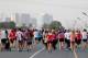 DUBAI, UNITED ARAB EMIRATES - MAY 04: Competitors take part in the 10km Wings for Life World Run at Nad Al Sheba Cycle Park on May 4, 2014 in Dubai, United Arab Emirates. (Photo by Francois Nel/Getty Images)