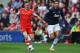 SOUTHAMPTON, ENGLAND - MAY 11: (L-R) Luke Shaw of Southampton holds off Chris Smalling of Manchester United during the Barclays Premier League match between Southampton and Manchester United at St Mary's Stadium on May 11, 2014 in Southampton, England. (Photo by Mike Hewitt/Getty Images)