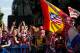 MADRID, SPAIN - MAY 18: Club Atletico de Madrid fans celebrate as they wait for the players after their tenth La Liga title at Neptuno Square on May 18, 2014 in Madrid, Spain. (Photo by Pablo Blazquez Dominguez/Getty Images)