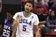 UCLA's Kyle Anderson urges on his team during the second half of a third-round game against Stephen F. Austin in the NCAA college basketball tournament, Sunday, March 23, 2014, in San Diego. (AP Photo/Gregory Bull)