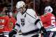 Los Angeles Kings' Anze Kopitar (11) reacts as he leaves the ice after his team's 3-1 loss to the Chicago Blackhawks in Game 1 of the Western Conference finals in the NHL hockey Stanley Cup playoffs in Chicago on Sunday, May 18, 2014. The Blackhawks won 3-1. (AP Photo/Nam Y. Huh)