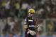 Kolkata Knight Riders' captain Gautam Gambhir looks back as he walks to pavilion after his dismissal during an Indian Premier League (IPL) cricket match against Chennai Super Kings' in Kolkata, India, Monday, May 14, 2012. (AP Photo/Bikas Das)
