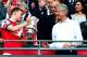 LONDON, ENGLAND - MAY 17: Captain Thomas Vermaelen of Arsenal passes the trophy to Arsene Wenger manager of Arsenal (R) after the FA Cup with Budweiser Final match between Arsenal and Hull City at Wembley Stadium on May 17, 2014 in London, England. (Photo by Clive Mason/Getty Images)
