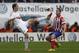 Real's Angel Di Maria, left, in action with Atletico's Koke, right, during a Spanish La Liga soccer match between Atletico de Madrid and Real Madrid at the Vicente Calderon stadium in Madrid, Spain, Sunday, March 2, 2014. (AP Photo/Gabriel Pecot)