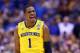 INDIANAPOLIS, IN - MARCH 30: Glenn Robinson III #1 of the Michigan Wolverines celebrates after a basket in the second half against the Kentucky Wildcats during the midwest regional final of the 2014 NCAA Men's Basketball Tournament at Lucas Oil Stadium on March 30, 2014 in Indianapolis, Indiana. (Photo by Andy Lyons/Getty Images)