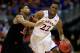 KANSAS CITY, MO - MARCH 13: Andrew Wiggins #22 of the Kansas Jayhawks drives upcourt as Marcus Smart #33 of the Oklahoma State Cowboys defends during the Big 12 Basketball Tournament quarterfinal game at Sprint Center on March 13, 2014 in Kansas City, Missouri. (Photo by Jamie Squire/Getty Images)