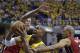Indiana Pacers' David West (21) puts up a shot against Miami Heat's Chris Andersen and Shane Battier, right, during the second half of Game 1 of the Eastern Conference finals NBA basketball playoff series, Sunday, May 18, 2014, in Indianapolis. (AP Photo/Darron Cummings)