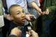 Dante Exum from Australia meets with reporters at the 2014 NBA basketball Draft Combine Thursday, May 15, 2014, in Chicago. Exum did not participate in his scheduled workout Thursday. (AP Photo/Charles Rex Arbogast)