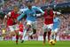 Bacary Sagna tussles with Yaya Toure.