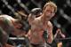 Jun 22, 2012; Atlantic City, NJ, USA; Clay Guida (left) fights Gray Maynard in a lightweight bout during UFC on FX at Revel Resort and Casino. Gray Maynard won the fight by split decision in the fifth round. Mandatory Credit: Joe Camporeale-USA TODAY Sports