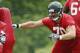 Atlanta Falcons offensive lineman lineman Jake Matthews works during their rookie minicamp football practice Saturday, May 17, 2014 in Buford, Ga. (AP Photo/John Bazemore)