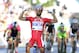 France's Nacer Bouhanni celebrates as he cuts the finish line to win the 10th stage of the Giro d'Italia, Tour of Italy cycling race, from Modena to Salso Maggiore, Italy, Tuesday, May 20, 2014. (AP Photo/Fabio Ferrari)