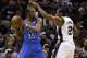 May 19, 2014; San Antonio, TX, USA; Oklahoma City Thunder forward Kevin Durant (35) is defended by San Antonio Spurs forward Kawhi Leonard (2) in game one of the Western Conference Finals in the 2014 NBA Playoffs at AT&T Center. The Spurs won 122-105. Mandatory Credit: Soobum Im-USA TODAY Sports