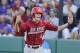 Arkansas' Brian Anderson celebrates after scoring a run against Kansas State in the first inning in an NCAA baseball regional game in Manhattan, Kan., Sunday, June 2, 2013. (AP Photo/Jeff Tuttle)