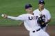 United States third baseman Matt Chapman throws out Cuba's Yasmani Tomas in the seventh inning of an exhibition baseball game in Papillion, Neb., Saturday, July 20, 2013, with shortstop Trea Turner, right. The United States won 1-0. (AP Photo/Nati Harnik)