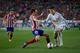 MADRID, SPAIN - MARCH 02: Cristiano Ronaldo (R) of Real Madrid CF competes for the ball with Juan Francisco Torres alias Juanfran (L) of Atletico de Madrid during the La Liga match between Club Atletico de Madrid and Real Madrid CF at Vicente Calderon Stadium on March 2, 2014 in Madrid, Spain. (Photo by Gonzalo Arroyo Moreno/Getty Images)
