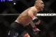 Renan Barao celebrates after beating Urijah Faber of Sacramento, CA during the first round of the Ultimate Fighting Bantamweight Championship Mixed Martial Arts bout in Newark, N.J. on Saturday, Feb. 1, 2014. Barao won after referee Herb Dean called the fight in the first round. (AP Photo/Tim Larsen)