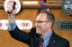 Cleveland Cavaliers general manager David Griffin holds a lucky bow tie after the Cavaliers won the first pick in the NBA draft lottery, in New York on Tuesday, May 20, 2014. The bowtie was worn by Nick Gilbert, son of Cavaliers owner Dan Gilbert, who represented the Cavs in the previous draft lottery, when they also won the first pick. It's the third time in four years the Cavs will be atop the draft after moving up from the ninth spot. (AP Photo/Kathy Willens)