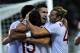 AS Roma Kevin Strootman, of the Netherland, center, celebrates with his teammates Miralem Pjanic, of Bosnia, back to camera second from left, and Federico Balzaretti, right, after scoring during a Serie A soccer match between FC Torino and AS Roma at the Olympic stadium, in Turin, Italy, Sunday, Nov. 3, 2013. (AP Photo/Massimo Pinca)