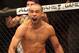 Sep 21, 2013; Toronto, Ontario, CAN; Renan Barao celebrates his victory over Eddie Wineland (not pictured) during their interim bantamweight championship bout at UFC 165 at the Air Canada Centre. Mandatory Credit: Tom Szczerbowski-USA TODAY Sports