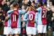 BIRMINGHAM, ENGLAND - MARCH 23: Christian Benteke #20 (R) of Aston Villa celebrates with teammates after scoring the opening goal during the Barclays Premier League match between Aston Villa and Stoke City at Villa Park on March 23, 2014 in Birmingham, England. (Photo by Laurence Griffiths/Getty Images)