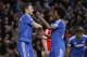 Chelsea's Frank Lampard, left, celebrates his goal against Stoke City with teammate Willian during their English Premier League soccer match at Stamford Bridge, London, Saturday, April 5, 2014. (AP Photo/Sang Tan)