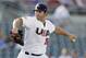 United States pitcher Carlos Rodon throws during the first inning of an exhibition game against Cuba, Thursday, July 18, 2013, in Des Moines, Iowa. (AP Photo/Charlie Neibergall)