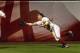 Alabama Outfielder Haylie McCleney (8) makes a leaping catch for an out during Alabama's NCAA softball regional game with Jacksonville State, Friday, May 17, 2013, at Rhoads Stadium in Tuscaloosa, Ala. Alabama won 4-0 to move on in the winner's bracket. (AP Photo/Alabama Media Group, Vasha Hunt)