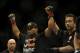 Feb 22, 2014; Las Vegas, NV, USA; Daniel Cormier (red gloves) celebrates his victory of Pactrick Cummins (not pictured) after their UFC light heavyweight bout at Mandalay Bay. Cormier won by way of a TKO in the first round. Mandatory Credit: Stephen R. Sylvanie-USA TODAY Sports