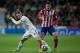 MADRID, SPAIN - FEBRUARY 05: Luka Modric (L) of Real Madrid CF competes for the ball with Koke (R) of Atletico de Madrid during the Copa del Rey semifinal first leg match between Real Madrid CF and Club Atletico Madrid at Estadio Santiago Bernabeu on February 5, 2014 in Madrid, Spain. (Photo by Gonzalo Arroyo Moreno/Getty Images)