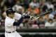 Detroit Tigers' Ian Kinsler singles and breaks his bat during the fifth inning of a baseball game against the Chicago White Sox in Detroit, Monday, April 21, 2014. (AP Photo/Carlos Osorio)