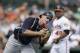 New York Yankees catcher Pete O'Brien catches a popup hit by Baltimore Orioles' Johnny Monell during the seventh inning of a spring exhibition baseball game in Sarasota, Fla., Saturday, March 15, 2014. (AP Photo/Carlos Osorio)