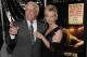 FILE - In this Dec. 16, 2008 file photo, former pro wrestler Ric Flair and his then girlfriend Jackie arrive at the premiere of the film
