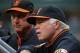 Baltimore Orioles' Buck Showalter, right, and bench coach John Russell stand in the dugout during the first inning of a baseball game against the Pittsburgh Pirates in Pittsburgh Tuesday, May 20, 2014. The Orioles won 9-2. (AP Photo/Gene J. Puskar)