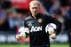 SOUTHAMPTON, ENGLAND - MAY 11: Manchester United interim coach Paul Scholes takes a warm up session before the Barclays Premier League match between Southampton and Manchester United at St Mary's Stadium on May 11, 2014 in Southampton, England. (Photo by Ian Walton/Getty Images)