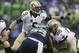 New Orleans Saints quarterback Drew Brees (9) signals at the line of scrimmage during the first half of an NFC divisional playoff NFL football game against the Seattle Seahawks in Seattle, Saturday, Jan. 11, 2014. (AP Photo/John Froschauer)