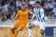 SAN SEBASTIAN, SPAIN - APRIL 05: Sergio Ramos of Real Madrid CF duels for the ball with Carlos Vela of Real Sociedad during the La Liga match between Real Sociedad and Real Madrid CF at Estadio Anoeta on April 5, 2014 in San Sebastian, Spain. (Photo by Juan Manuel Serrano Arce/Getty Images)
