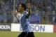 Uruguay's Cristian Rodriguez celebrates scoring a goal against Jordan during the World Cup play off first leg soccer match between Jordan and Uruguay at Amman International stadium in Amman, Jordan, Wednesday, Nov. 13, 2013. (AP Photo/Hassan Ammar)