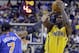 Indiana Pacers guard Lance Stephenson shoots over New York Knicks forward Carmelo Anthony during the second half of an NBA basketball game in Indianapolis, Thursday, Jan. 16, 2014. The Pacers defeated the Knicks 117-89. (AP Photo/Michael Conroy)