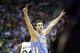 Denver Nuggets' Danilo Gallinari (8) celebrates in the fourth quarter during an NBA basketball game against the Utah Jazz, Wednesday, April 3, 2013, in Salt Lake City. The Nuggets defeated the Jazz 113-96. (AP Photo/Rick Bowmer)