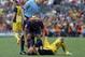 Atletico's Diego Costa lies injured on the pitch during a Spanish La Liga soccer match between FC Barcelona and Atletico Madrid at the Camp Nou stadium in Barcelona, Spain, Saturday, May 17, 2014. (AP Photo/Emilio Morenatti)