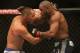 Jun 15, 2013; Winnipeg, MB, Canada; Rashad Evans (right) fights Dan Henderson during their light heavyweight bout at UFC 161 at MTS Centre. Mandatory Credit: Tom Szczerbowski-USA TODAY Sports